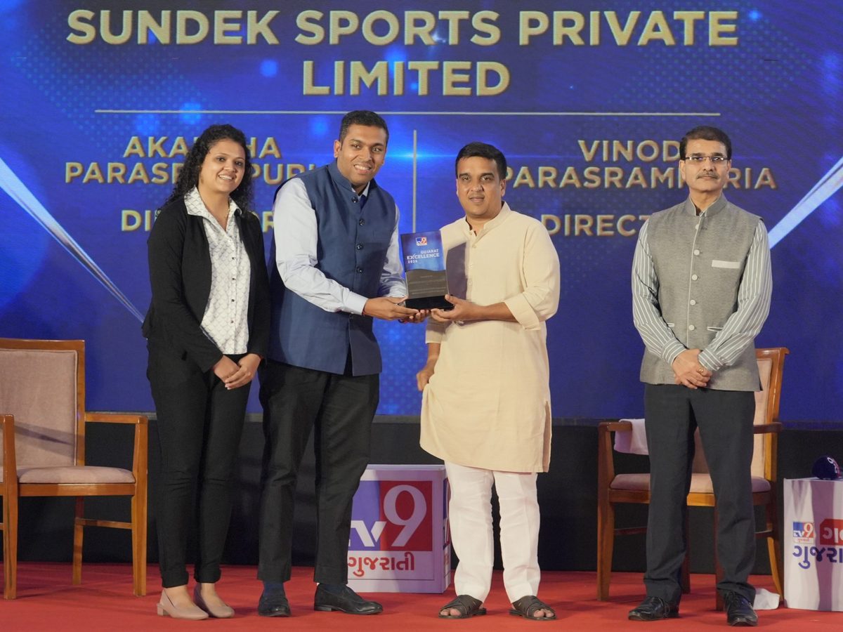Sundek Sports Private Limited directors receiving the TV9 Gujarat Excellence Award 2026